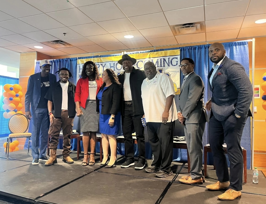 Reading Is Lit founders with community leaders and authors at a literary event